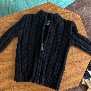 Zip up cashmere sweater.